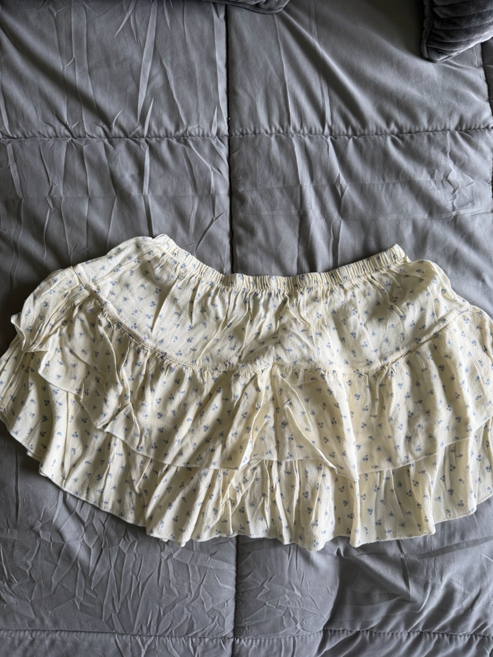 Brandy Melville Pale Yellow Mini Skirt with Blue Floral Print